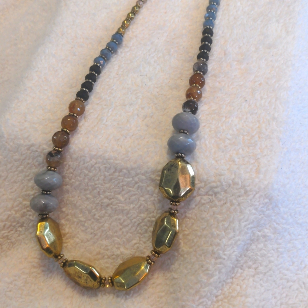 Fashion Necklace Goldtone with Gray, Brown, Black and Blue Beads.